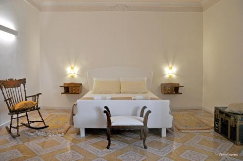 Ένα ή περισσότερα κρεβάτια σε δωμάτιο στο Agorà b&b
