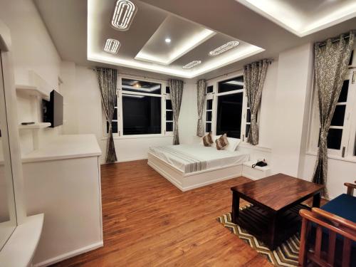 Μια τηλεόραση ή/και κέντρο ψυχαγωγίας στο BAGO Harmony Home - A Boutique Villa