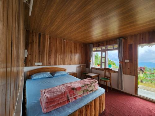 Voodi või voodid majutusasutuse Boho Homestay, Rangbhang toas