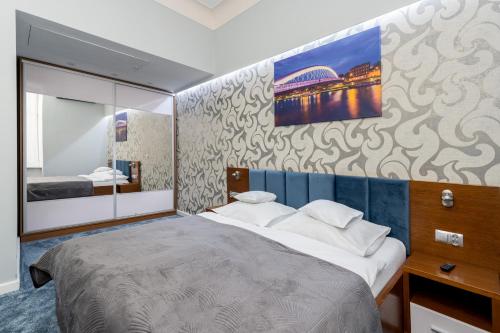 Llit o llits en una habitació de BlueApart with Terrace