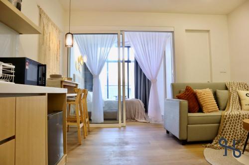 Kuchyň nebo kuchyňský kout v ubytování The Shore by Homesuite'