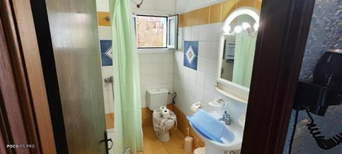 Ένα μπάνιο στο Giannis Gerakios apartments by climbing house