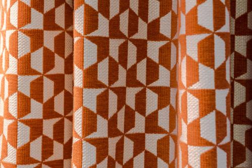 an orange and white fabric with a diamond pattern at Redland Place - Your Apartment in Bristol