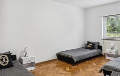 En eller flere senge i et værelse på Moderne Fewo Mit Ausblick