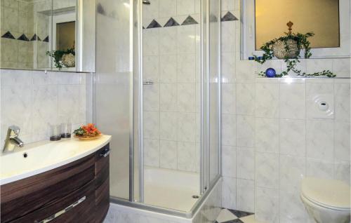 a bathroom with a shower and a sink at Nice Home In Grossarl With 4 Bedrooms And Wifi in Grossarl