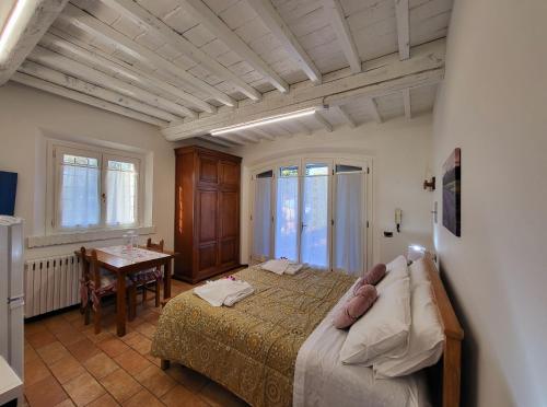 Katil atau katil-katil dalam bilik di Residence Antico Borgo