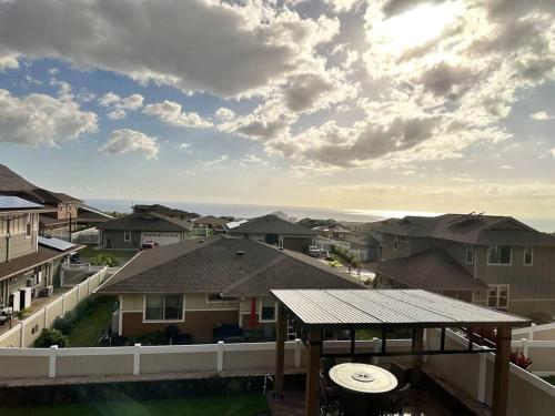 a view from the balcony of a house at New 4 Bedroom Home with Ocean and Gorgeous Mountain Views in the gated community of Mauna Olu in Waianae