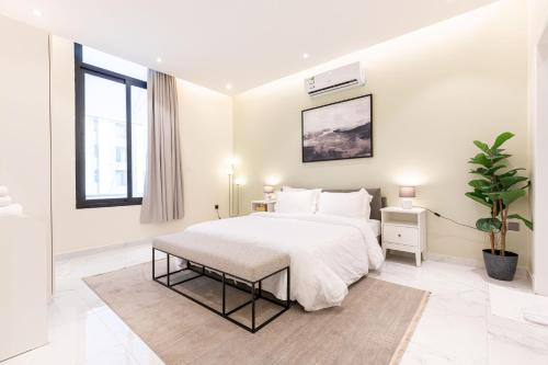 Postel nebo postele na pokoji v ubytování Amber Hospitality - Al Qairawan