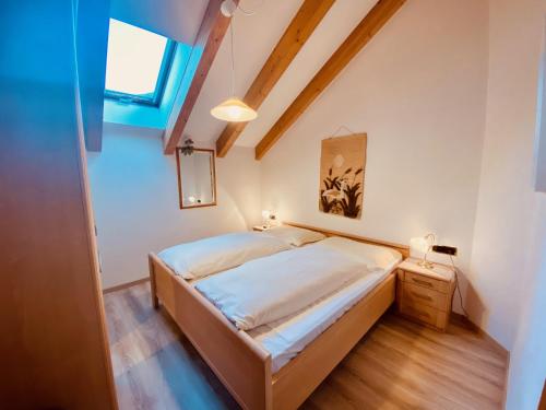 Postel nebo postele na pokoji v ubytování Apartments Residence Montana