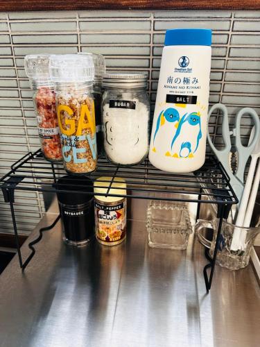 a shelf in a refrigerator with jars of food at 蒼穹 in Asahikawa