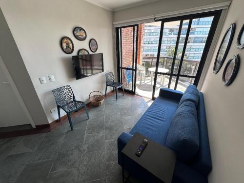 Χώρος καθιστικού στο Apartamento pé na areia em Riviera de São Lourenço