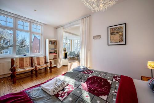 Katil atau katil-katil dalam bilik di Haus Übersee Wohnung Fidji