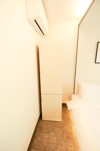 Hotel Myeongjiにあるベッド