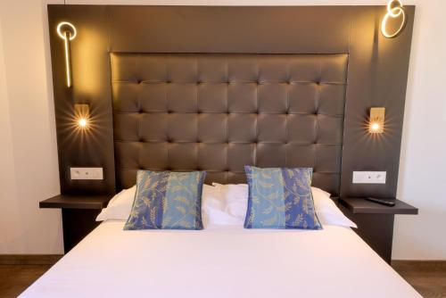 Katil atau katil-katil dalam bilik di Hotel Saint Christophe
