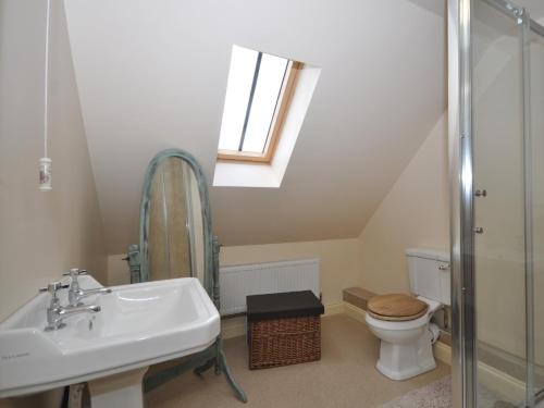 a bathroom with a sink and a toilet at 2 Bed in Newthorpe 47031 