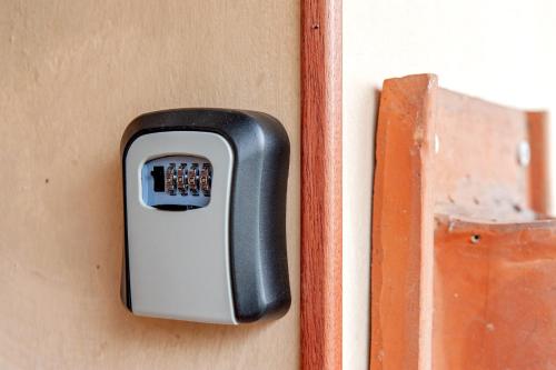a close up of a door handle on a door at Casa Zito in San Giuliano Terme