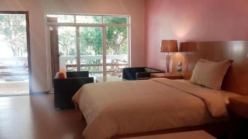 Posteľ alebo postele v izbe v ubytovaní Indra Koh Rong Resort
