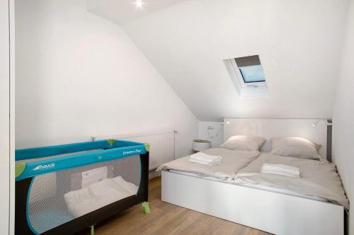 Ένα ή περισσότερα κρεβάτια σε δωμάτιο στο Seeblick und doch zentral