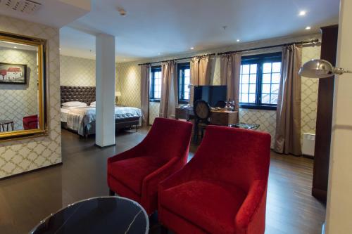 Postel nebo postele na pokoji v ubytování Det Hanseatiske Hotel