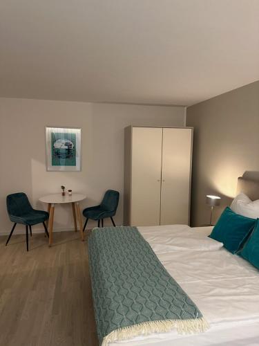 Katil atau katil-katil dalam bilik di Livingroom Mathildenhöhe