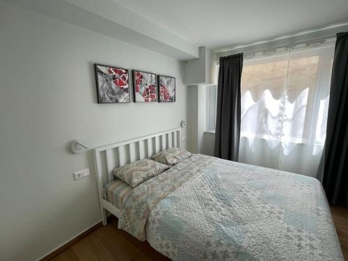 Llit o llits en una habitació de Maria's apartment in Faliro