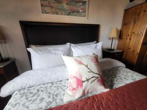 Katil atau katil-katil dalam bilik di Boutique Chalet in Calheta