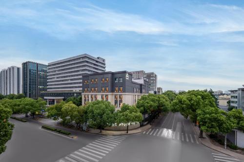 a rendering of a city with trees and buildings at Atour Hotel Shanghai Hongqiao Xinzhuang Business District in Shanghai