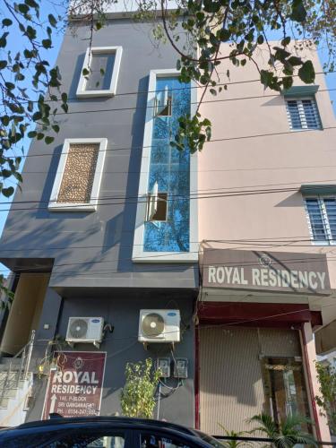 a building with a sign that reads royal residency at ROYAL RESIDENCY in Gangānagar