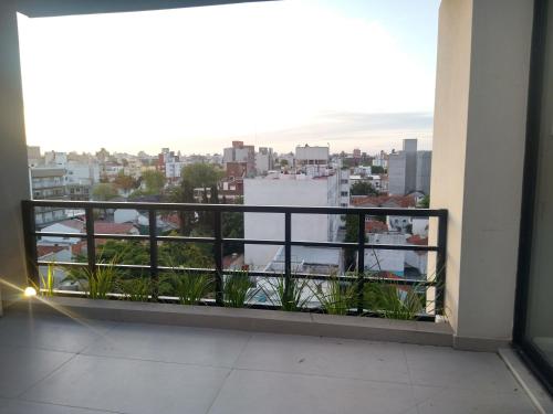 a balcony with a view of a city at Monoambiente nuevo , Zona Guemes in Mar del Plata