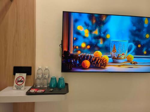 Red's Hotelにあるテレビまたはエンターテインメントセンター
