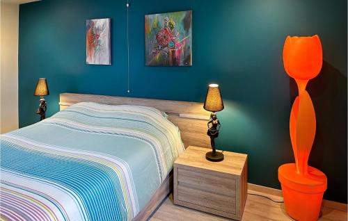 Llit o llits en una habitació de 3 Bedroom Awesome Home In Zottegem
