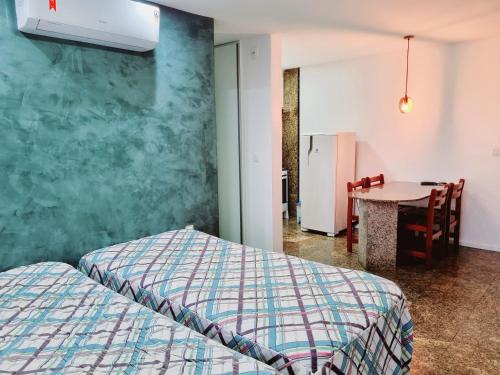 Katil atau katil-katil dalam bilik di Flats Mar Atlântico Residence