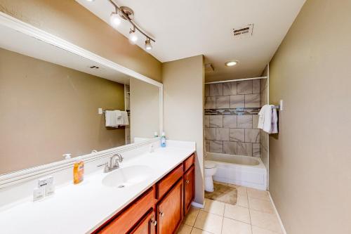 a bathroom with a sink and a toilet at Village at West Meadow 2441 in Phoenix