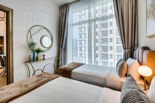 Postel nebo postele na pokoji v ubytování Cozy and comfy 2 bedroom in Dubai Marina