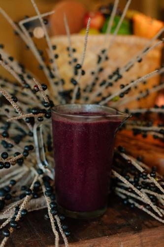 a purple cup sitting on top of a table at Rancho das Estrelas in Carolina