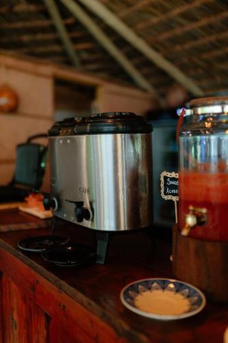 a slow cooker sitting on top of a counter at Rancho das Estrelas in Carolina