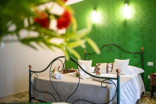 Ein Bett oder Betten in einem Zimmer der Unterkunft B&B Sulla Rupe