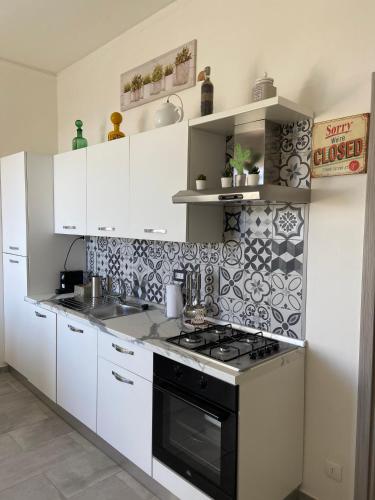 Η κουζίνα ή μικρή κουζίνα στο casa Nenne appartamento con due camere da letto