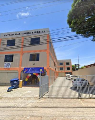 a building with a gate in front of it at edf torres ferreira in Lauro de Freitas