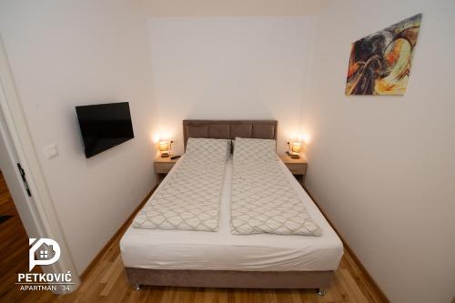 Postel nebo postele na pokoji v ubytování Petković apartmani 34