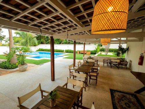 Kolam renang di atau dekat dengan Pousada Manacá Exclusive Suítes