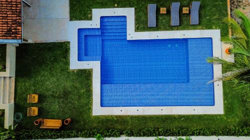 Kolam renang di atau dekat dengan Pousada Manacá Exclusive Suítes