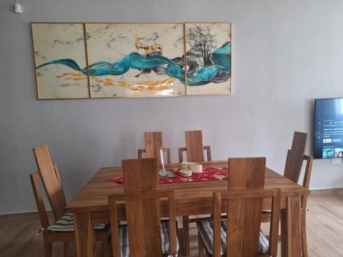 TV a/nebo společenská místnost v ubytování Paradis des Anges Appartement