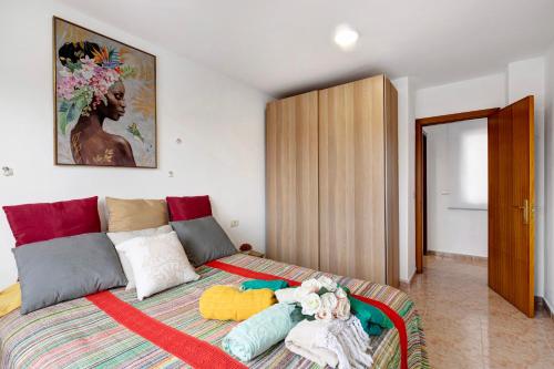 Un pat sau paturi într-o cameră la Apartamento Rebeca