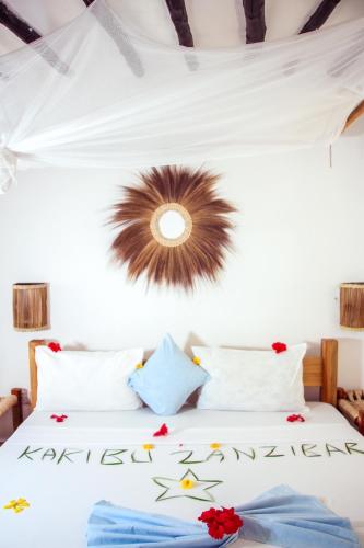 Voodi või voodid majutusasutuse TIKI Beach Club & Resort toas