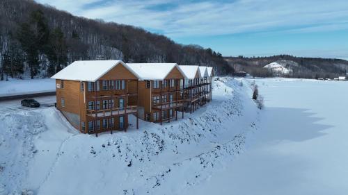 an aerial view of a building in the snow at Keweenaw Waters Resort in Houghton