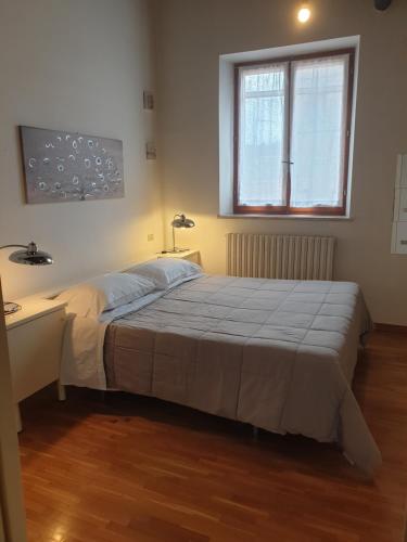 Ένα ή περισσότερα κρεβάτια σε δωμάτιο στο Residence Vanvitelli