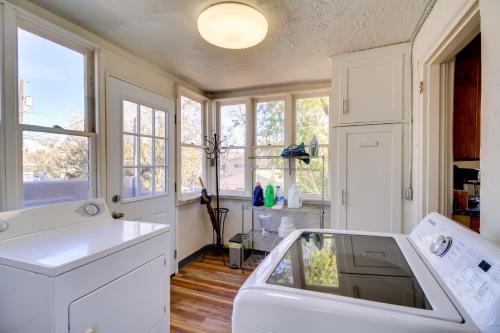 a kitchen with a sink and a dishwasher at Silver Hill Apartment Near UNM Campus! in Albuquerque