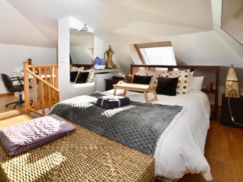 a bedroom with a large bed and a table at CONFORT Y RELAX JUNTO AL RIO EN ANDORRA LA VELLA - HuT-8352 in Santa Coloma