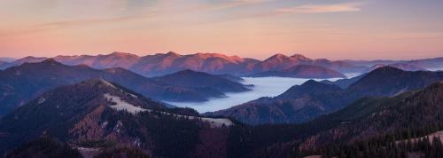 a view of a mountain range at sunset at Horská chata Smrekovica in ľubochňa